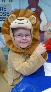 Connor pretended to be a Lion at Storytime