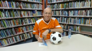 Morris in soccer top signing books (Small)