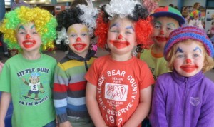 McCallum, Henry, Charlie, Kobe, and Gwen dressed up as clowns for Circus Storytime