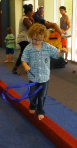 Arden learnt to twirl and balance at the same time at Circus Storytime