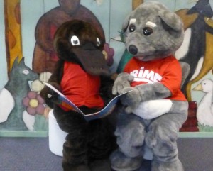 Freeda and Prime Possum read a story together