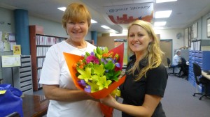 Good Guy of the Week: Home Library Volunteer Jo Krats is congratulated by Tammy