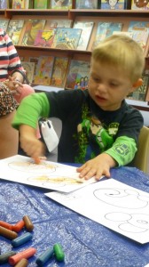 Kody, 4, has fun during craft at Storytime