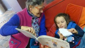 Dinah reads to Niamh 4 after they enjoyed teh Peppa Pig Show