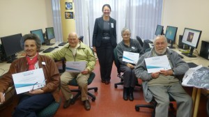 Recent Tech Savvy Seniors graduates Joan, Neville & Wendy with trainer Monica. 