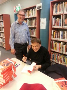 Peter Douglass chates with author Graeme Simsion