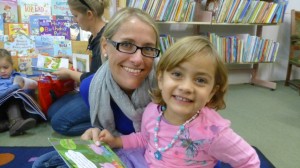 Lisa-Mari reads with her Mum at Storytime