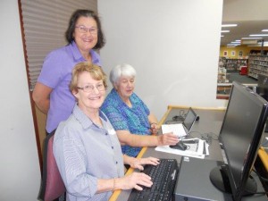 photo of Caroline helping Val and Ruth at the Tech Savvy Seniors class today. There were so many attendees that Michael was run off his feet. Tablets were brought along by some of the students today which proved challenging. Ruth learnt about tabs and the picture folder on hers. Another student learnt about social media . Two of our elderly gents shut down and rebooted the PC successfully a number of times, also managing to find their tabs and searches with little assistance. Another gent found out about passwords, security and choices of devices to suit his needs. Regards Caroline Caroline Eisenhauer Branch Librarian Cowra Library 