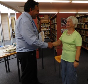 Scott presents Volunteer Marie with her certificate