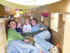 Mark, Millie, Tessa and Birgitte inside their cubby house