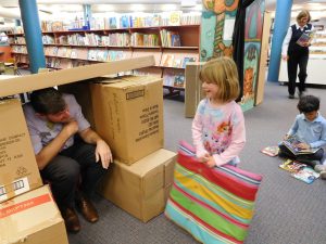 Lucy with her cubby house and visitor